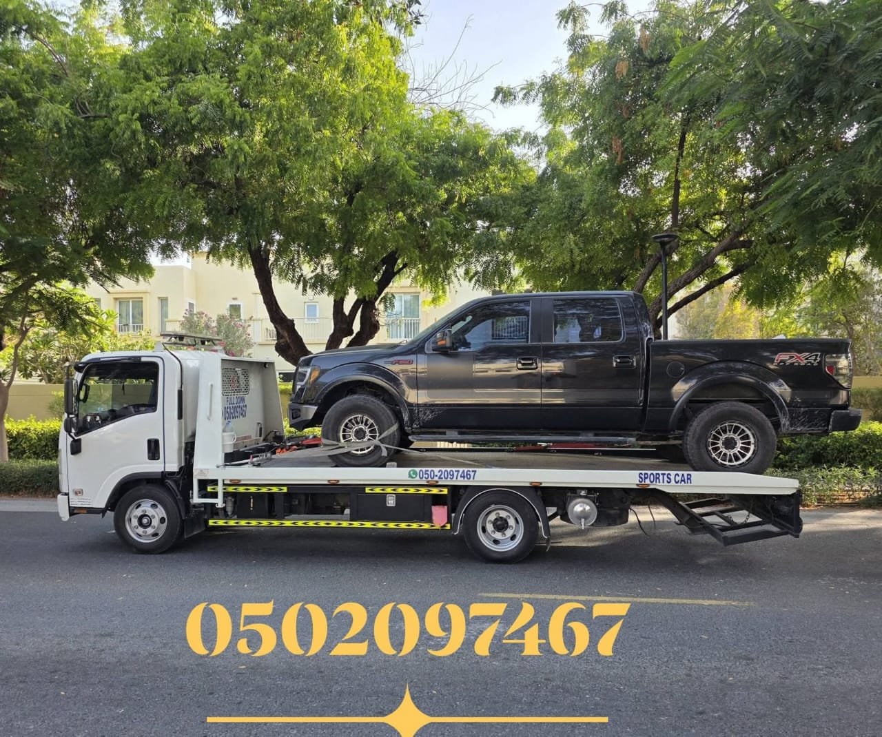Ahmed Car Recovery Dubai — flatbed towing professional service