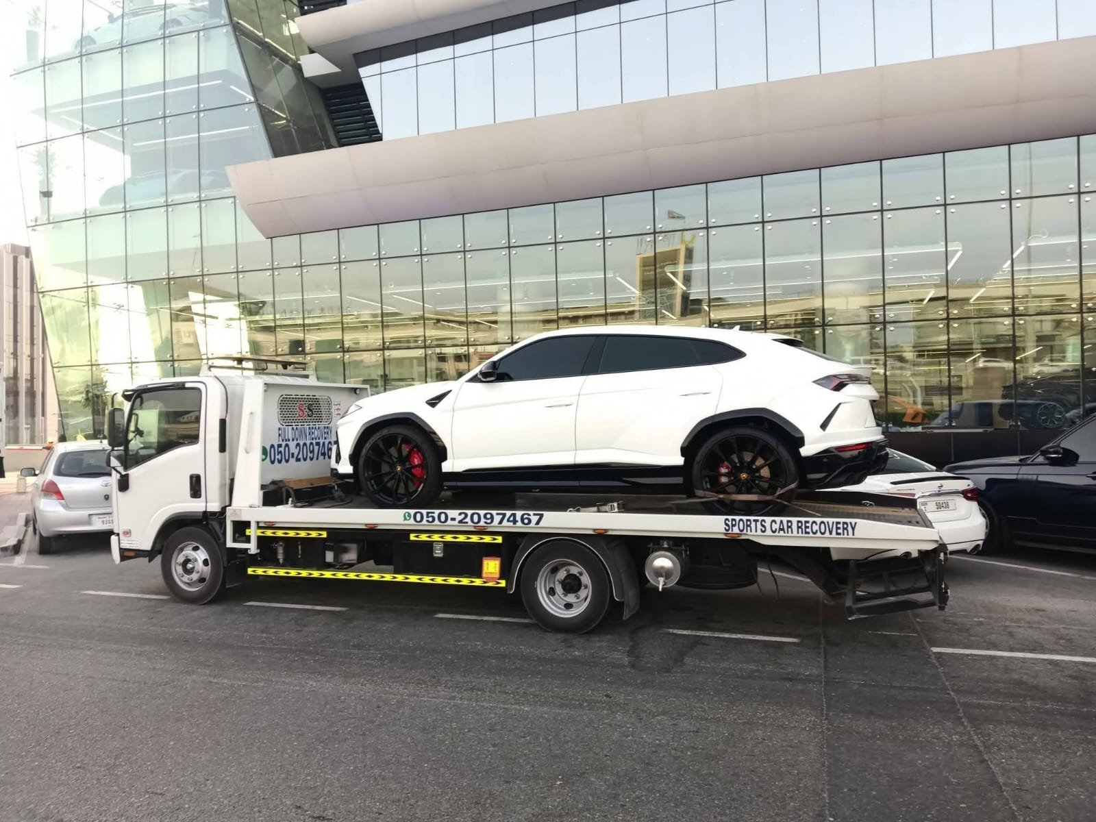 Luxury car recovery Dubai — Lamborghini Urus on flatbed