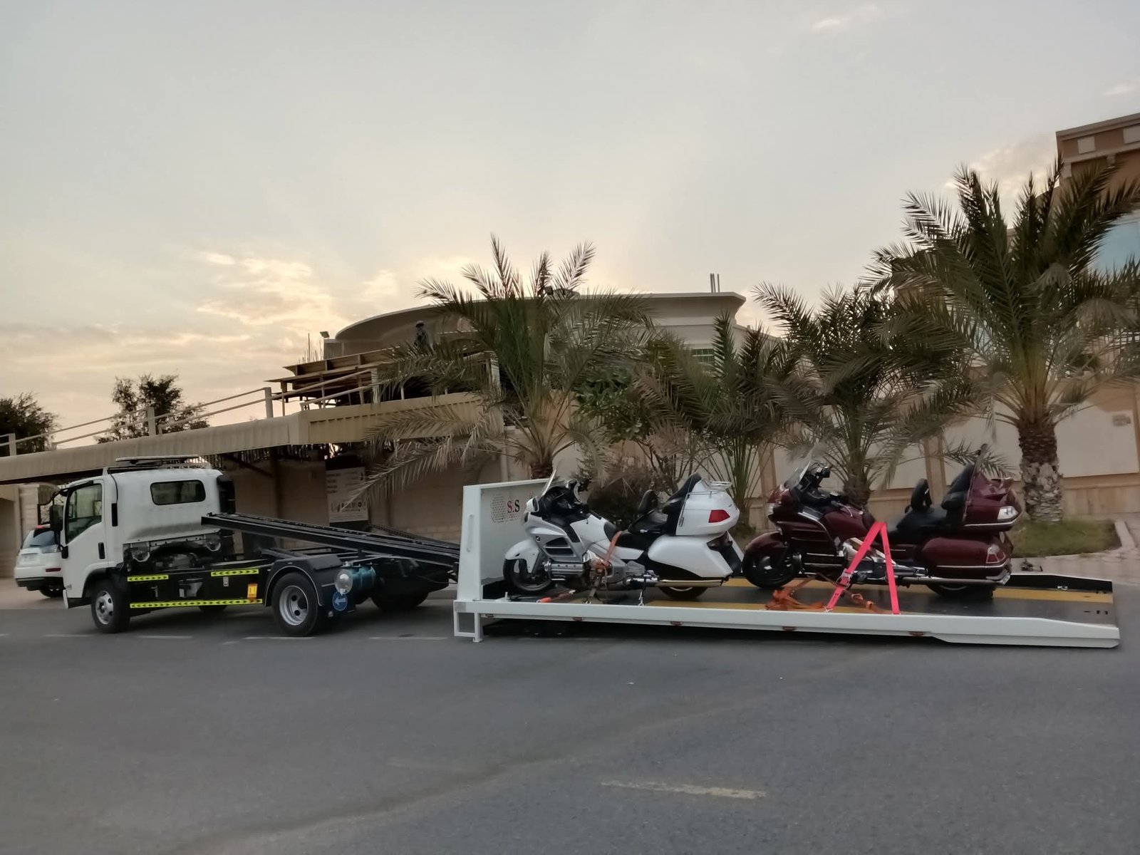 Luxury supercar recovery Dubai — flatbed transport
