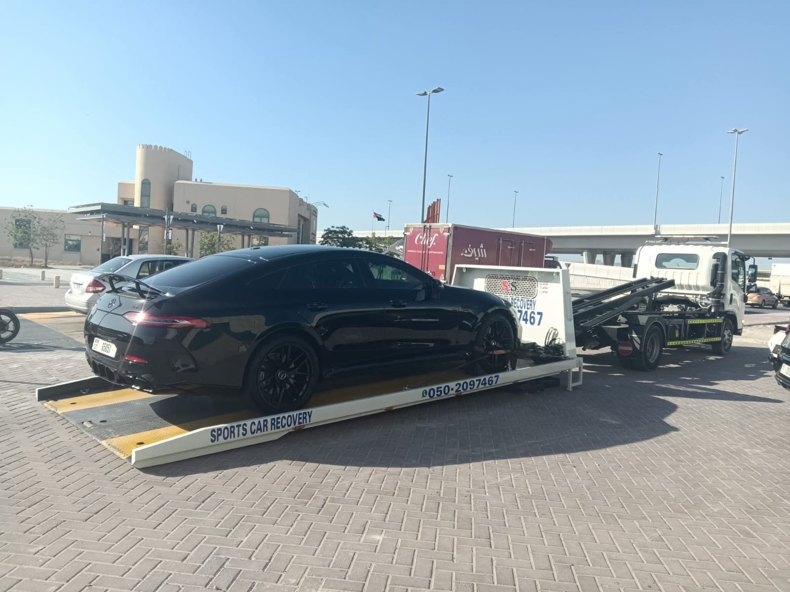 Exotic sports car recovery Dubai flatbed